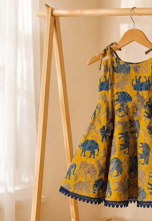 Mustard elephant print dress front view